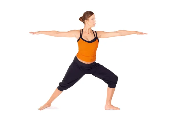 Adatto donna attraente che pratica esercizio di yoga — Foto Stock
