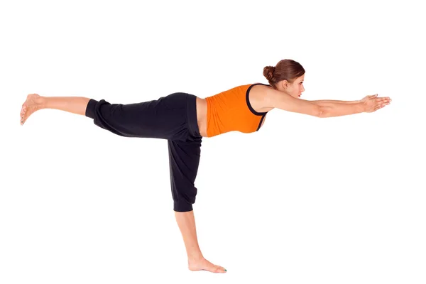 Vrouw warrior pose 3 yoga oefening beoefenen — Stockfoto