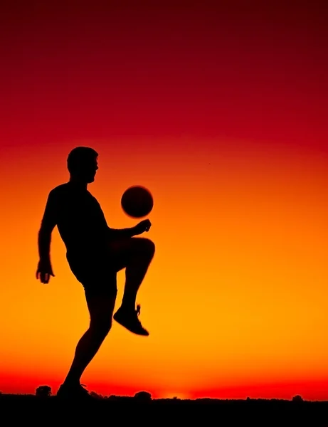 Sunset'nda futbol — Stok fotoğraf