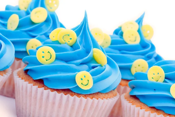 Cara sonriente cupcakes —  Fotos de Stock