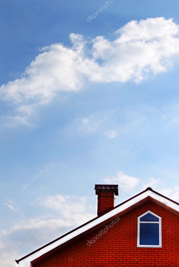 House and blue sky with cloud