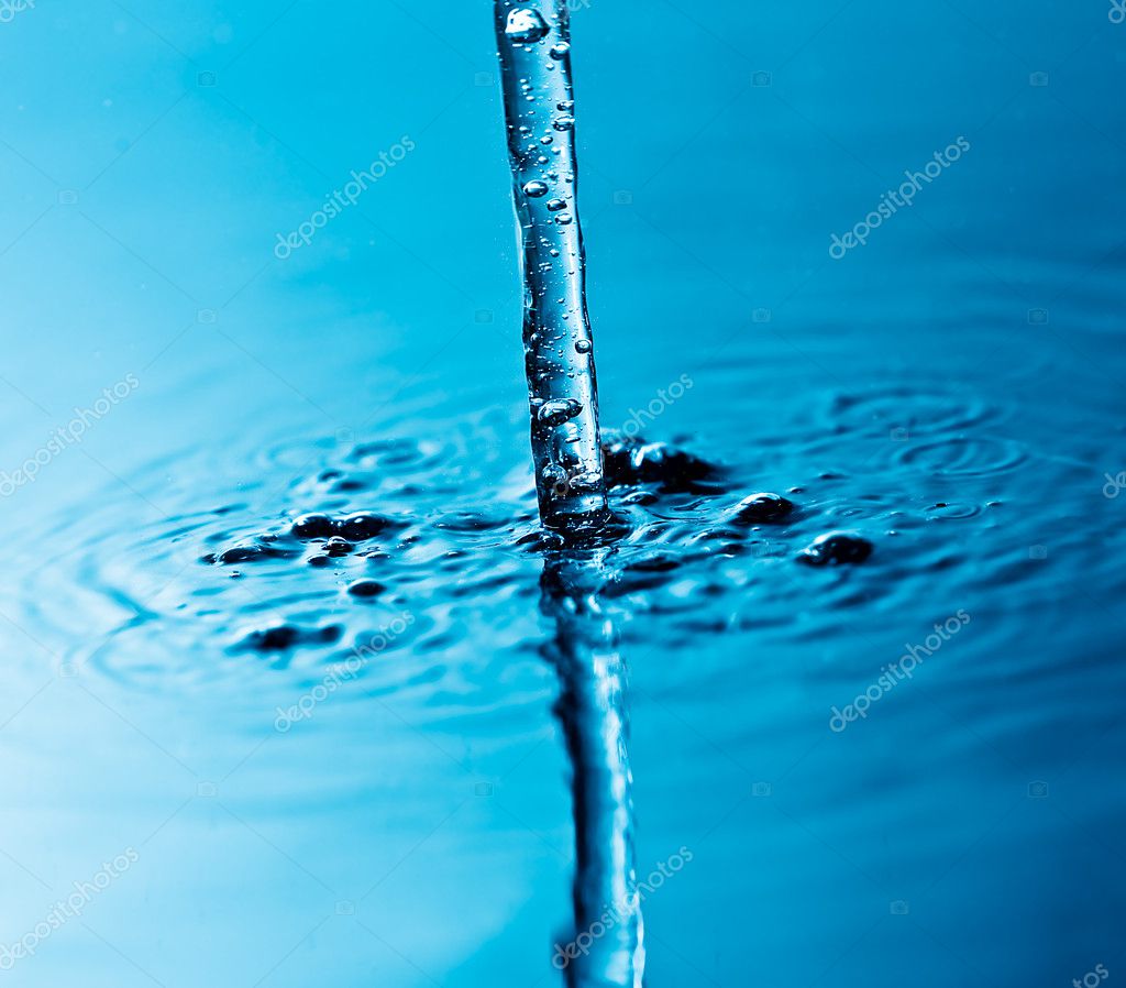 Pouring water — Stock Photo © andreasgradin 2794966