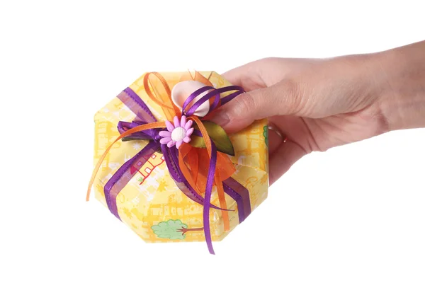 Hand giving a present — Stock Photo, Image