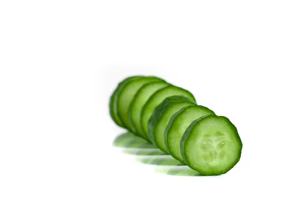Cucumber slices isolated over white background — Stock Photo, Image
