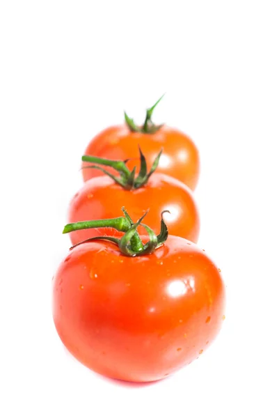 Red tomato vegetable with cut isolated on white background — Stock Photo, Image