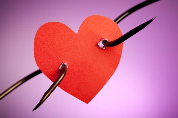 Pierced Heart On Hook — стоковое фото