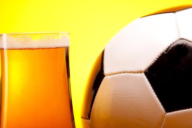 Chilled beer and football concept clipart