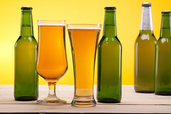 Stock image Chilled beer on yellow background!