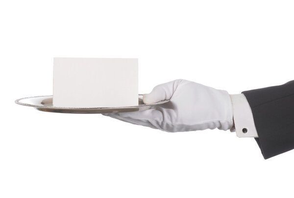 Butlers hand with tray and note