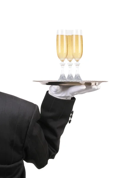 Butler com copos de vinho na bandeja — Fotografia de Stock