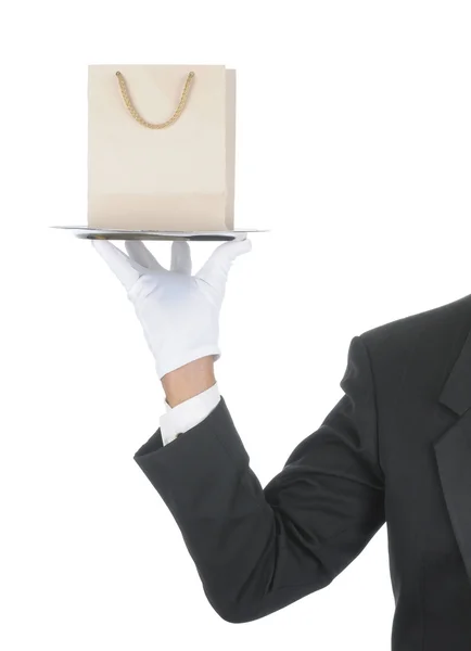 Butler with Gift Bag on Tray — Stock Photo, Image
