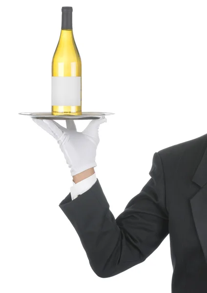 Butler butelką wina na tacy — Zdjęcie stockowe