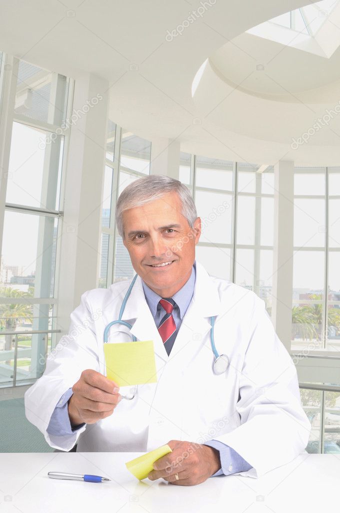 Doctor handing prescription