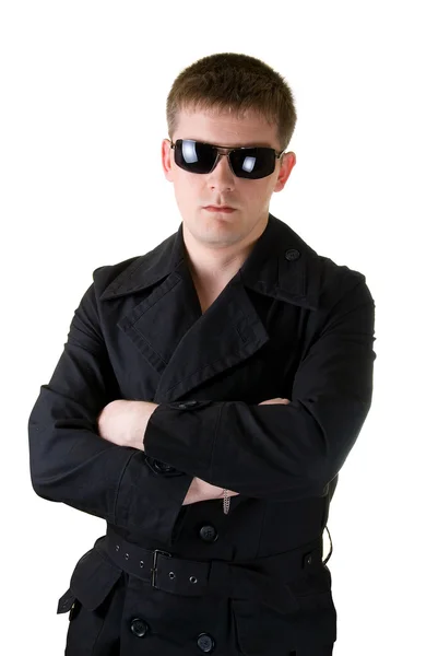 Man in black coat with sunglasses — Stock Photo, Image