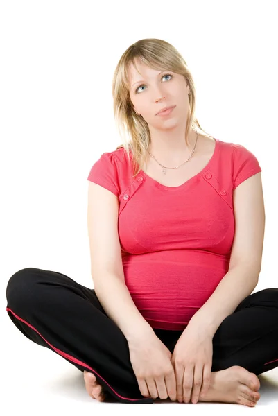 Donna seduta incinta — Foto Stock