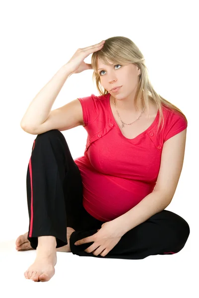 Donna incinta pensante — Foto Stock
