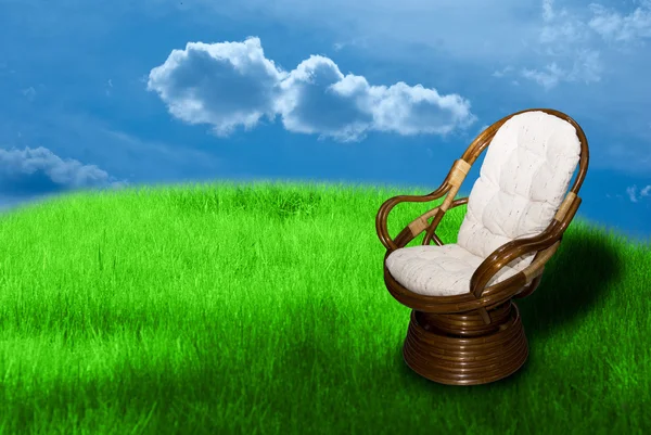 Rocking chair on green grass — Stock Photo, Image