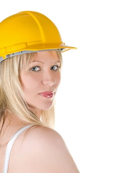 Жінка в жовтому будівельному шоломі — стокове фото