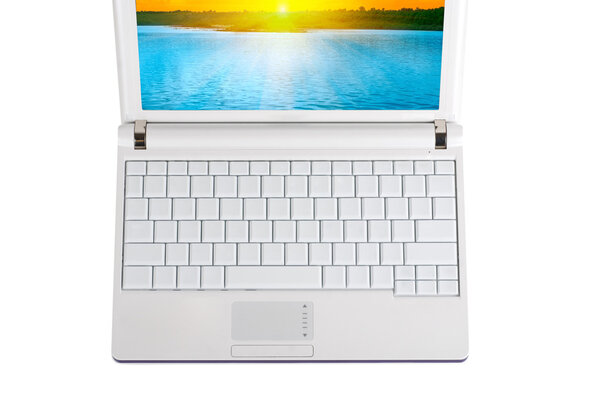 White laptop with empty keys
