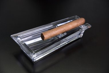 Cigar at ashtray clipart