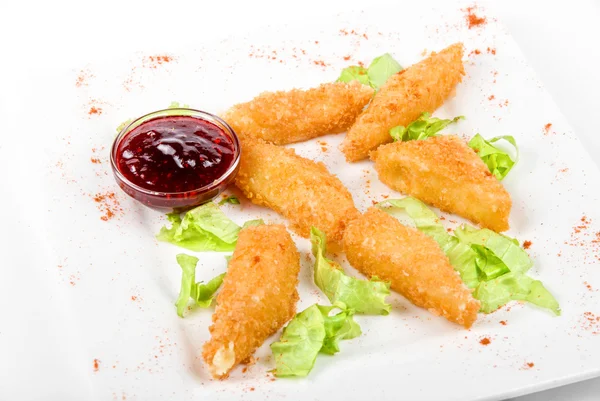 stock image Baked cheese with cranberries sauce