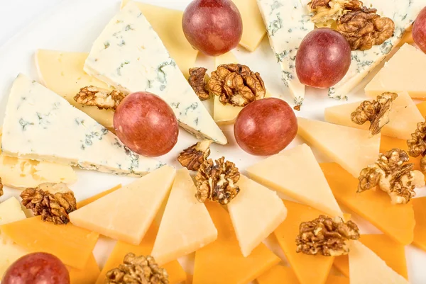 Cheese and grapes — Stock Photo, Image