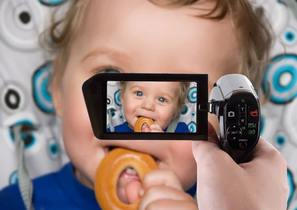 Baby boy recording to camcorder — Stock Photo, Image
