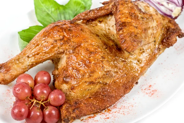 Polovina pečené kuře closeup — Stock fotografie