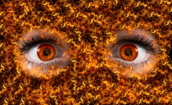 Olho vermelho no fogo — Fotografia de Stock