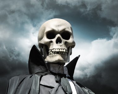 Grim reaper. death's skeleton on a cloudy dramatic sky clipart