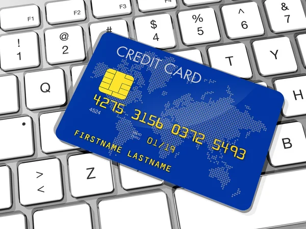 Cartão de crédito em um teclado de computador — Fotografia de Stock