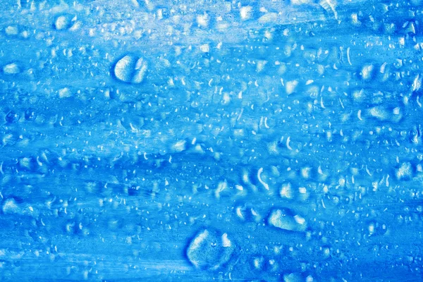 Blauwe getextureerde oppervlak met water drops — Stockfoto