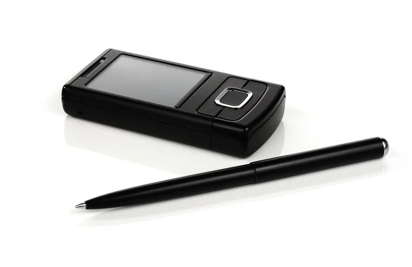 Telefon och penna — Stockfoto
