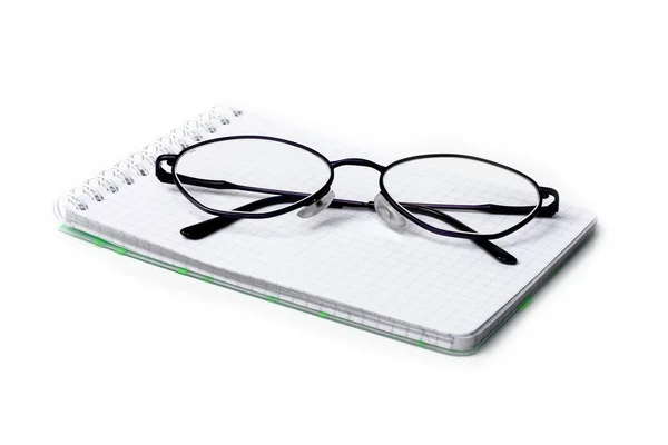 Brille und Notizbuch — Stockfoto
