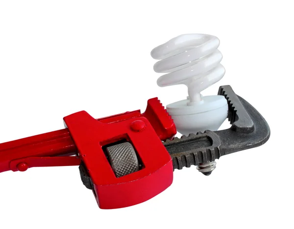 Chave ajustável e lâmpada — Fotografia de Stock