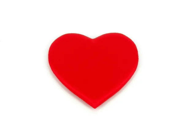 Un corazón rojo aislado sobre fondo blanco — Foto de Stock