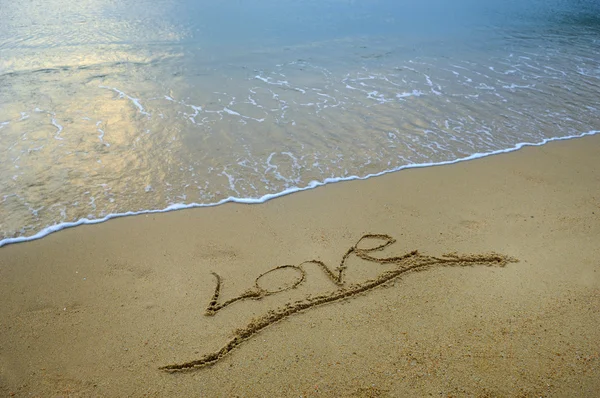 Ik hou van je in het zand. — Stockfoto