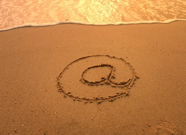 Stock image Email symbol draw on beach