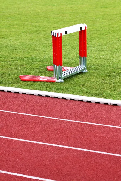 Track and hurdles — Stock Photo, Image