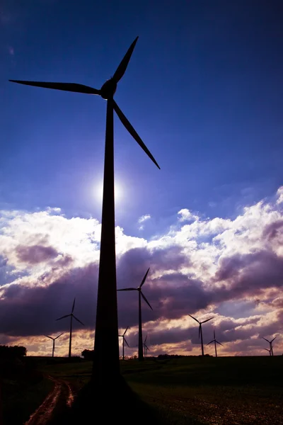 Windmills against a cloudy sky — Stock Photo, Image