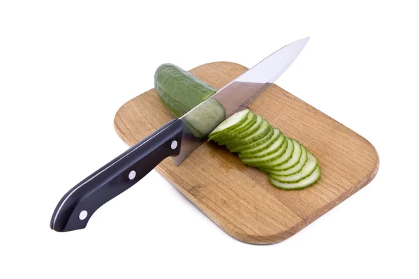 Cucumber and kitchen knife — Stock Photo, Image