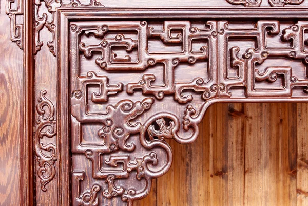 Antiguo tallado en madera de estilo chino — Foto de Stock