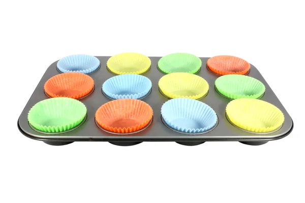 Copas para muffin en un molde —  Fotos de Stock