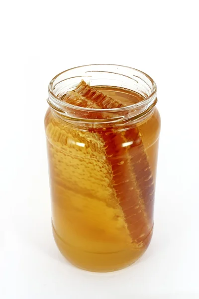 Honing en honingraat — Stockfoto