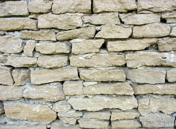 Velha parede de tijolo branco áspero — Fotografia de Stock