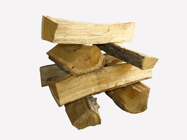 Pila di tronchi tagliati legna da ardere isolata su bianco — Foto Stock