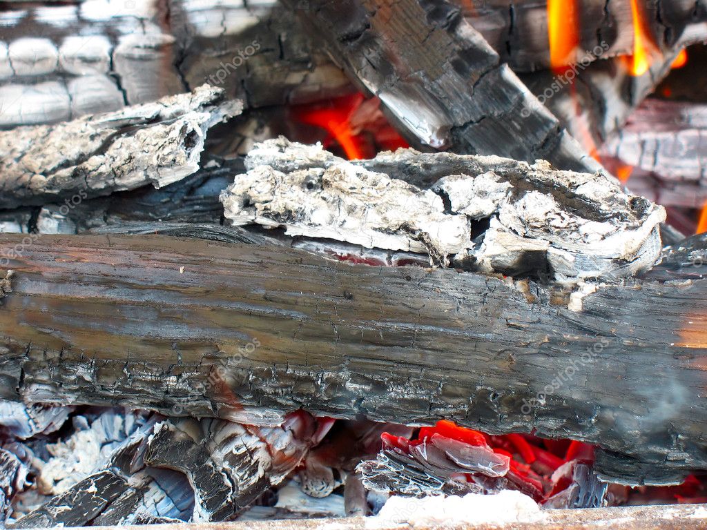 Closeup of burning fire wood logs and ash Stock Photo by ©arogant 3571065