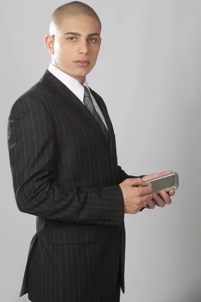 Hombre de negocios guapo en Gray —  Fotos de Stock