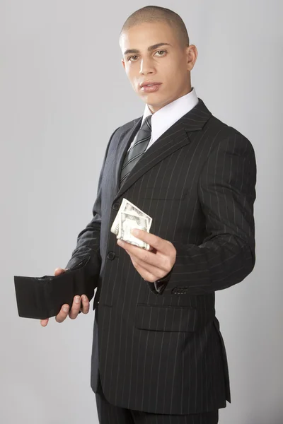 Hombre de negocios guapo en Gray — Foto de Stock