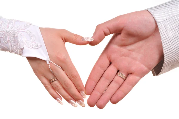 Bride and groom hands making heart — Stock Photo, Image